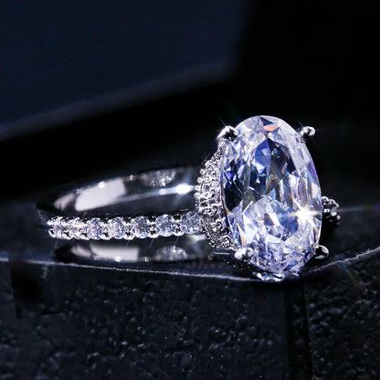Huitan Oval Finger Ring Band Dazzling Brilliant CZ Stone Four Prong Setting Classic Wedding Anniversary Gift for Wife&Girlfriend