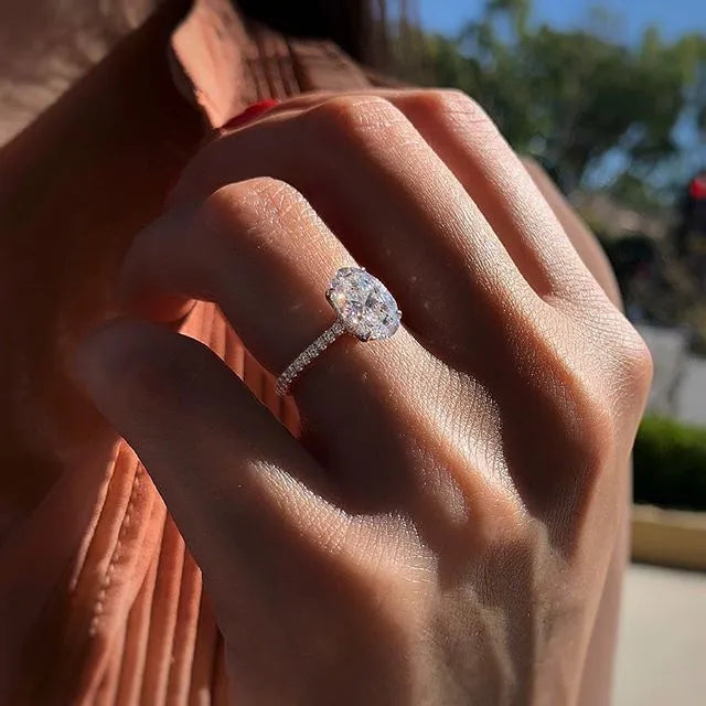 Huitan Oval Finger Ring Band Dazzling Brilliant CZ Stone Four Prong Setting Classic Wedding Anniversary Gift for Wife&Girlfriend
