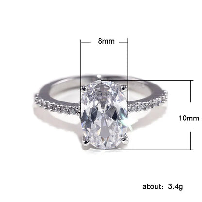 Huitan Oval Finger Ring Band Dazzling Brilliant CZ Stone Four Prong Setting Classic Wedding Anniversary Gift for Wife&Girlfriend