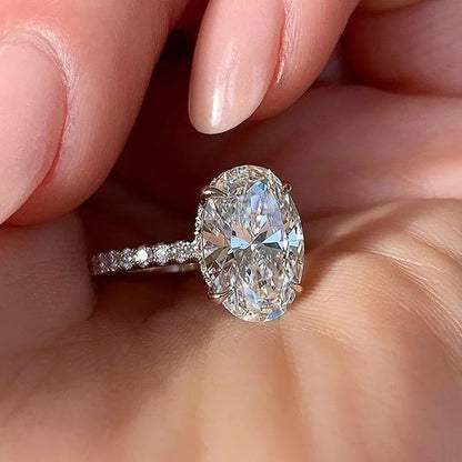 Huitan Oval Finger Ring Band Dazzling Brilliant CZ Stone Four Prong Setting Classic Wedding Anniversary Gift for Wife&Girlfriend